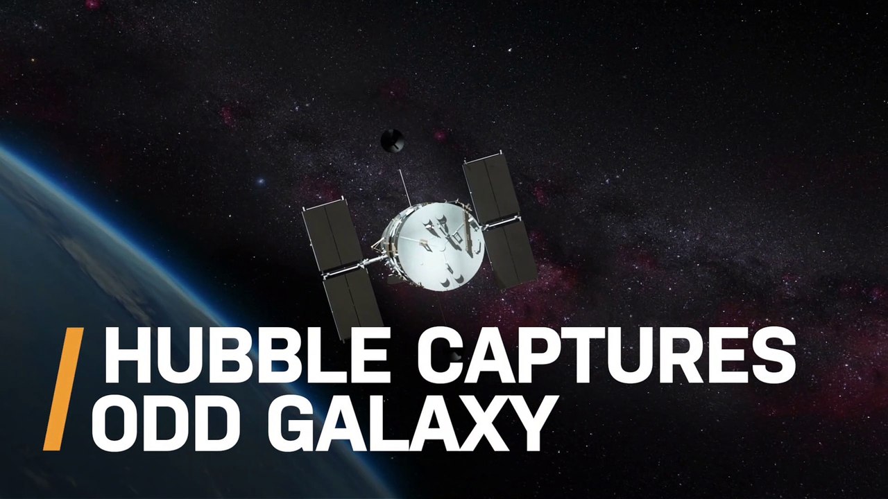 Hubble Captures Odd Galaxy That Looks Like an Otherworldly Deep Sea Creature