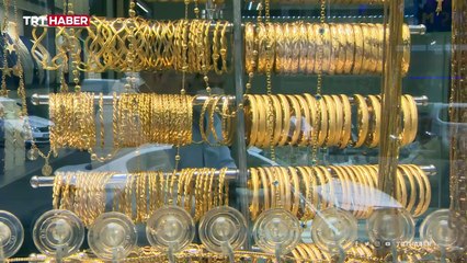 Kuyumcuyu sahte altın dişle dolandırdılar