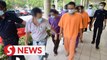 Remand on eight men in river pollution probe extended