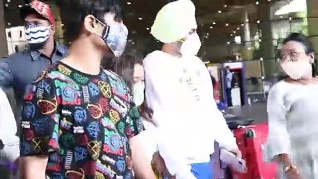 Neha Kakkar And Rohanpreet Singh Return to Mumbai; Twinning In White Newlyweds Are All Smiles