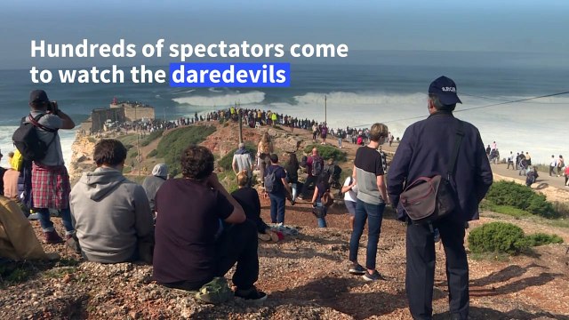 Big wave surfers try to ride giant swell in Nazaré