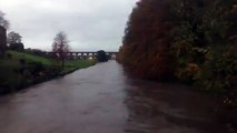 River Calder running high in Whalley, Ribble Valley, Lancashire