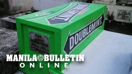 Family keeps peculiar tradition, paints father’s tomb to look like chewing gum box for ‘Undas’
