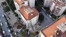 Vinçlerle tutulan apartmanda depremin verdiği hasar gün ağarınca ortaya çıktı