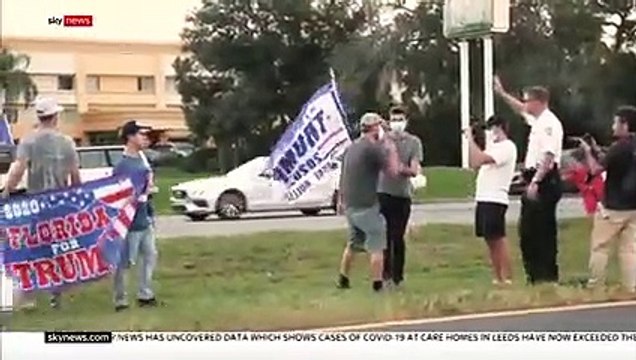 The USA Electoral Rivals Trump and Biden supporters clash at Florida rally