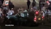 Police smash car windows, family trapped at protest