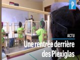 Une rentrée derrière des vitres en plastique pour les élèves égyptiens