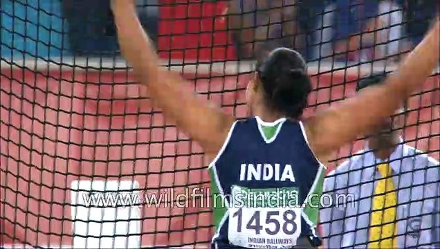 Krishna Poonia wins gold medal in discus throw