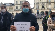 Les commerçants manifestent pour demander le droit d'ouvrir