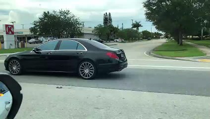 Limo Hauling a Speed Boat