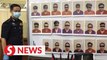 Perak police smash Macau Scam syndicate in KL, 22 arrested
