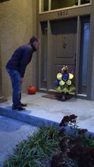 Young Girl Trick or Treating Takes a Tumble