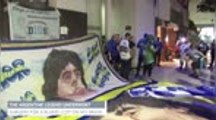 Argentina fans cheer for Maradona recovery after successful surgery