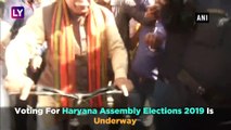 Haryana Assembly Polls 2019: CM Manohar Lal Khattar Rides Cycle To Polling Booth To Cast His Vote