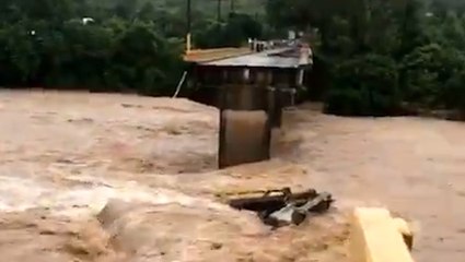 Hurricane Eta flooding washes away bridge