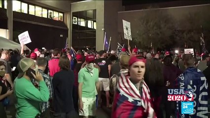 Gun-toting Trump supporters mob vote-counting centres in key states