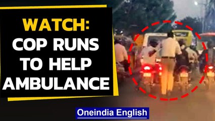 Viral video: Cop runs 2 km to help ambulance in Hyderabad | Oneindia News