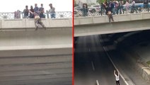 İntihar için köprüye çıkan adamı kurtarmak isteyen vatandaşlar böyle seferber oldu