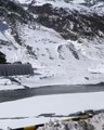 Person Witnesses Beautiful Snow-covered Mountains And Water Stream In Himachal Pradesh, India