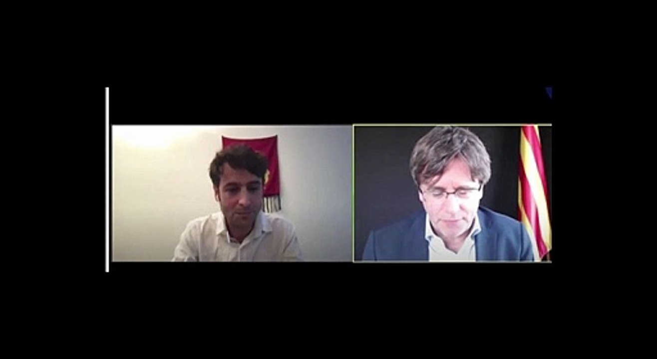 Boicot virtual: gritos de "Arriba España" y el himno español a todo trapo en una conferencia del fugado Puigdemont