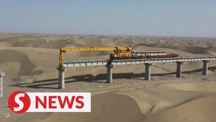 China's largest desert to see railway bridge built by Nov