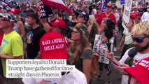 Armed Trump supporters gather outside vote count centre in Arizona