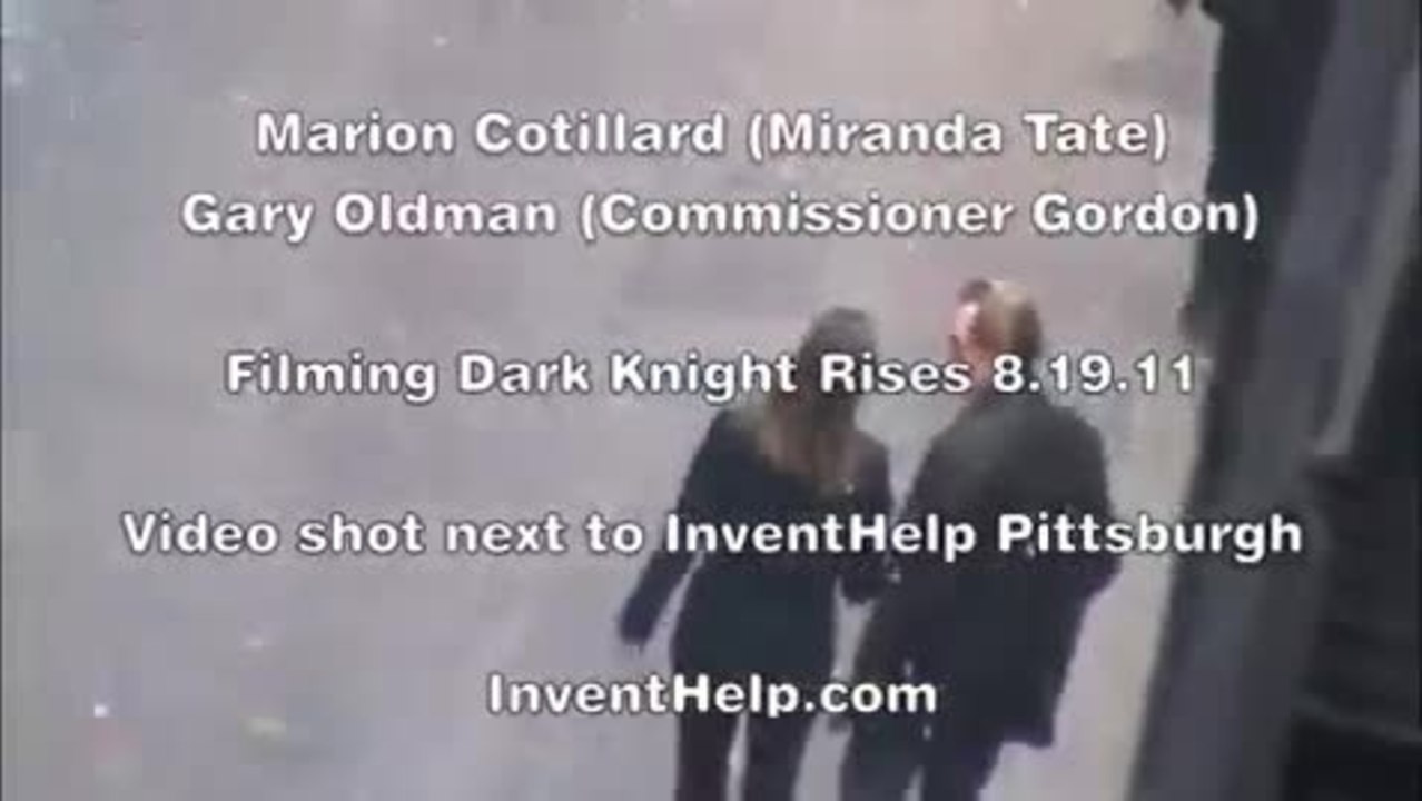 Marion Cotillard  and Gary Oldman on Dark Knigh...