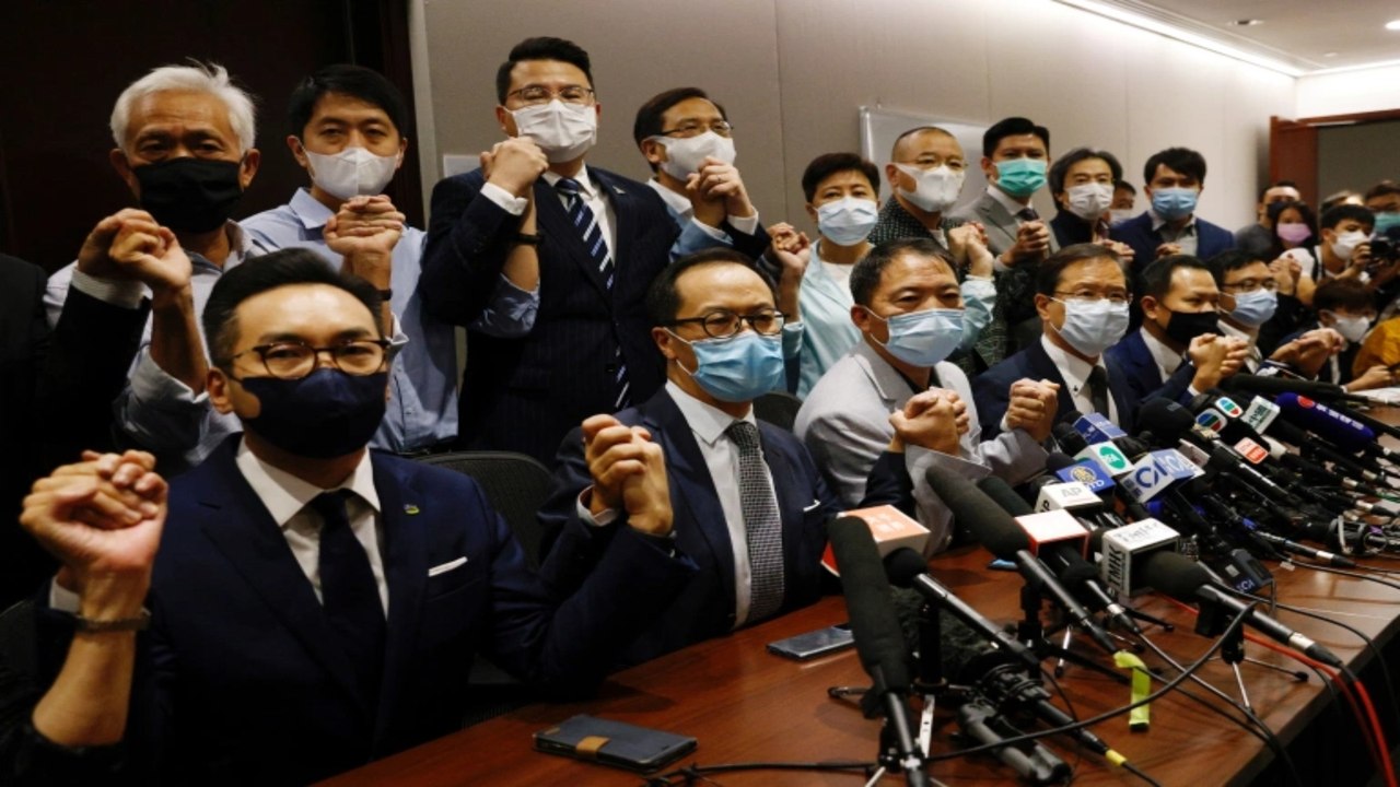 Hong Kong: More than a dozen legislators resign...