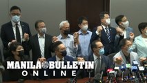 All Hong Kong pro-democracy lawmakers to resign as China crushes opposition