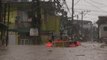 Residents rescued as typhoon floods city