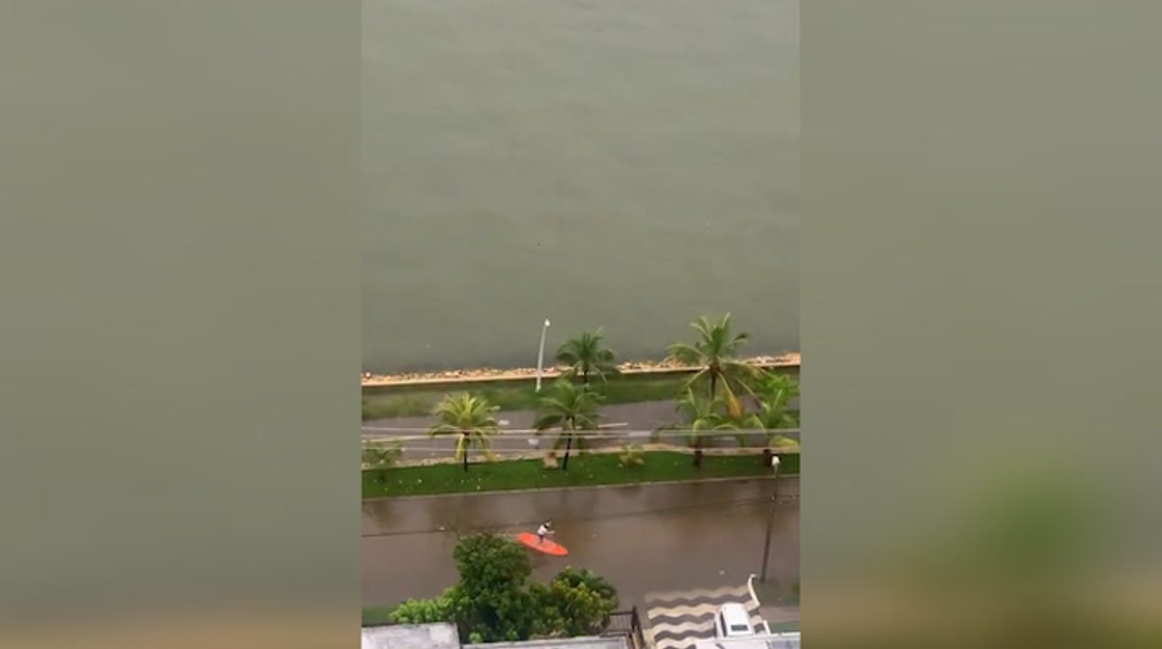 Paddleboarding the flooded streets of Colombia during Iota