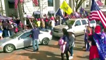 Cheers greet Trump's convoy at D.C. protests