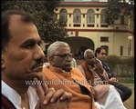 Lalu Prasad Yadav chews paan or betel leaf at a political meeting