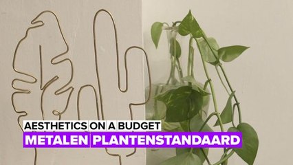 Industrieel decor: metalen plantenstandaard