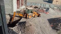 Working with Al Nahr building contracting LLC.loading dump truck.