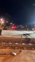 Car Drives Over a Train Track That's Under Construction Twice