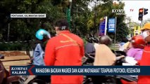 Bagikan Masker, Mahasiswa Untan Ajak Warga Terapkan Protokol Kesehatan