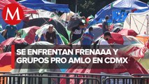 Grupo pro AMLO se enfrenta con FRENAAA tras intentar quitar sus casas de campaña