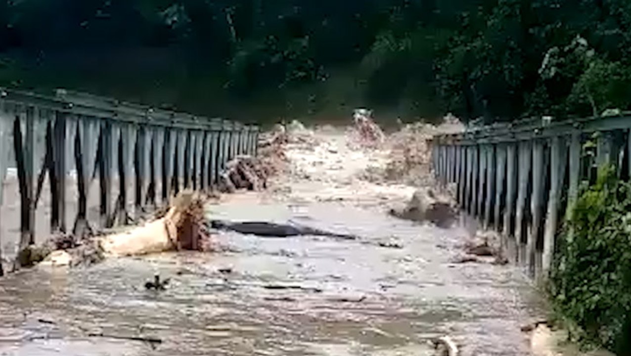 Raging swollen river overtakes bridge in Honduras