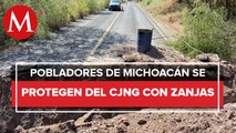 Pobladores excavan zanjas en carreteras para frenar al CJNG