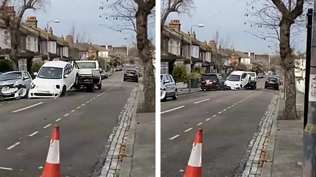 Une dépanneuse défonce toutes les voitures d'une rue en partant