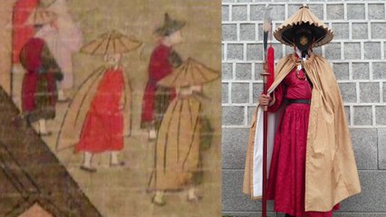 경복궁 수문장, 도깨비 마스크 이어 새 비옷 갖춰 / YTN
