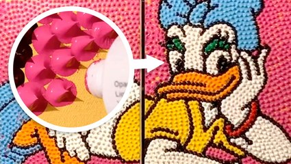 These dots of paint form 3D portraits of celebrities and cartoon characters