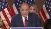 What appears to be hair dye runs down his face as Rudy Giuliani sweats election results