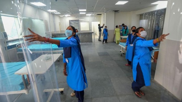 MHA adds hospital beds to ramp up Delhi's Covid care facilities; Curfew in Ahmedabad till Monday; more