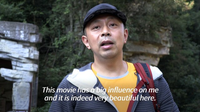 Towering outdoor lift zips tourists up China's 'Avatar' cliff