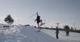 Kid Jumps Off Ramp And Crashes On Snow While Skiing