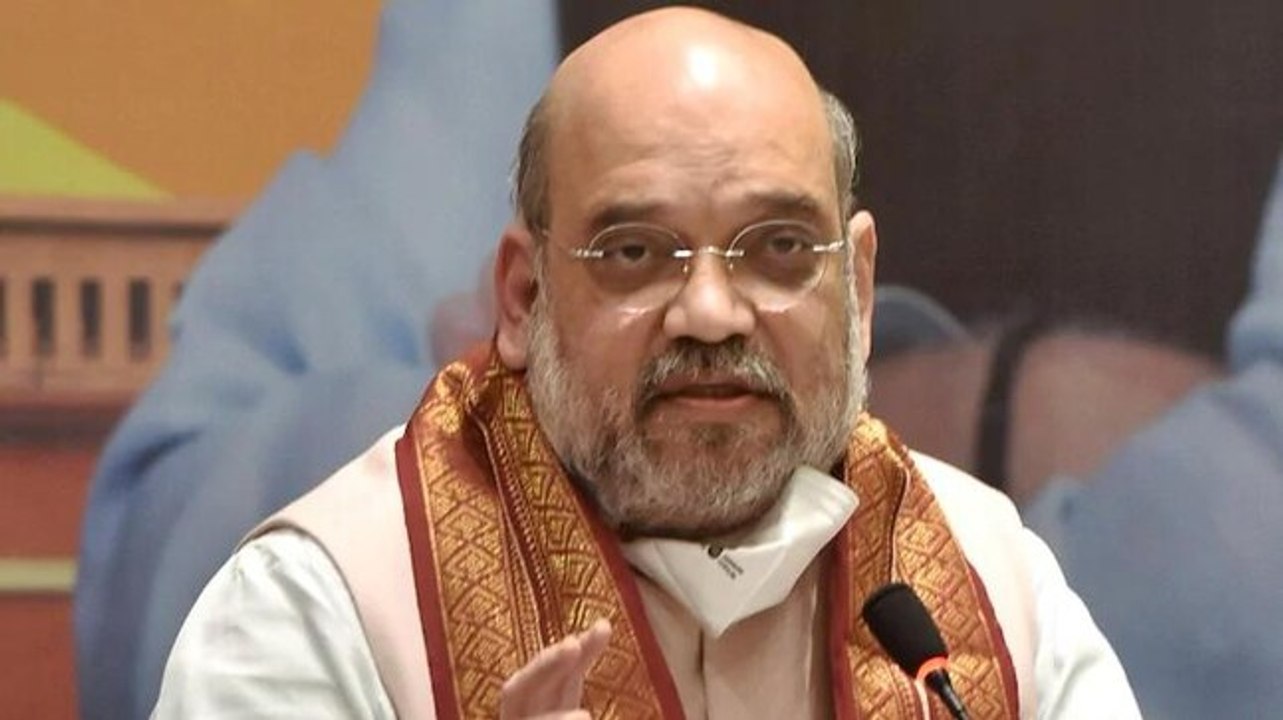 Amit Shah breaks security protocols, hits the streets to greet supporters