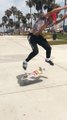 Skaters Perform Tricks On Boardwalk
