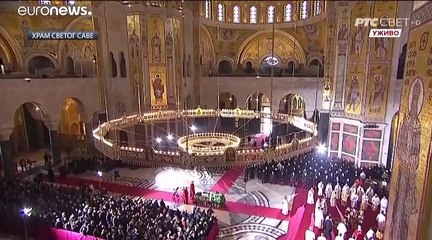 Thousands pay homage as Serbia's Patriarch is laid to rest after dying of COVID-19